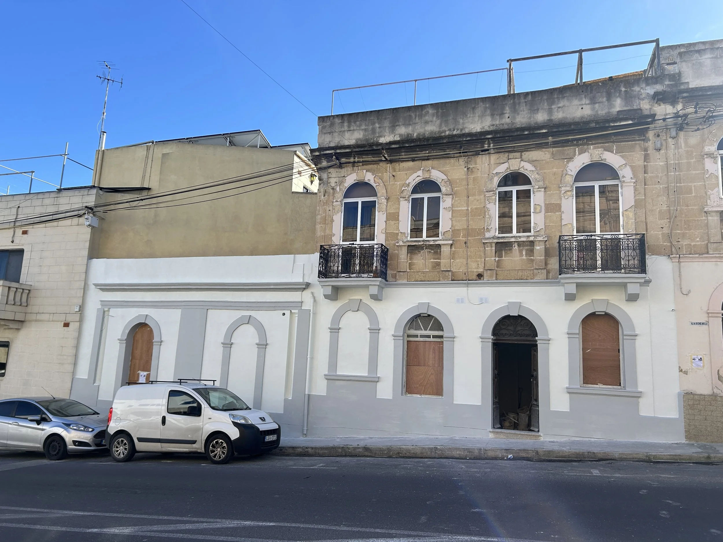 Exterior facade plastered with GR1000 and painted for weather protection.