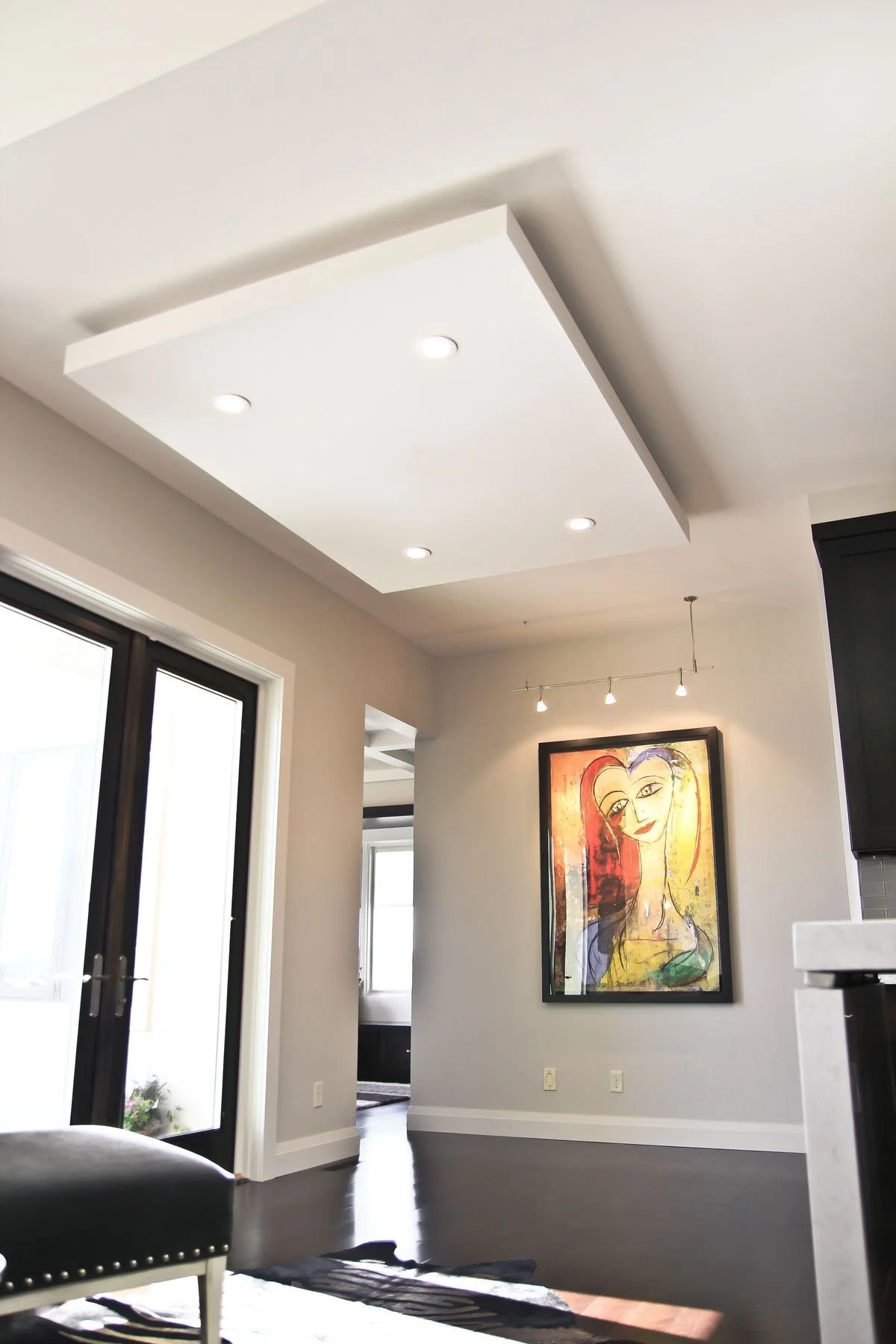 Dropped gypsum ceiling idea in a living room, adding depth and modern style to a Maltese interior