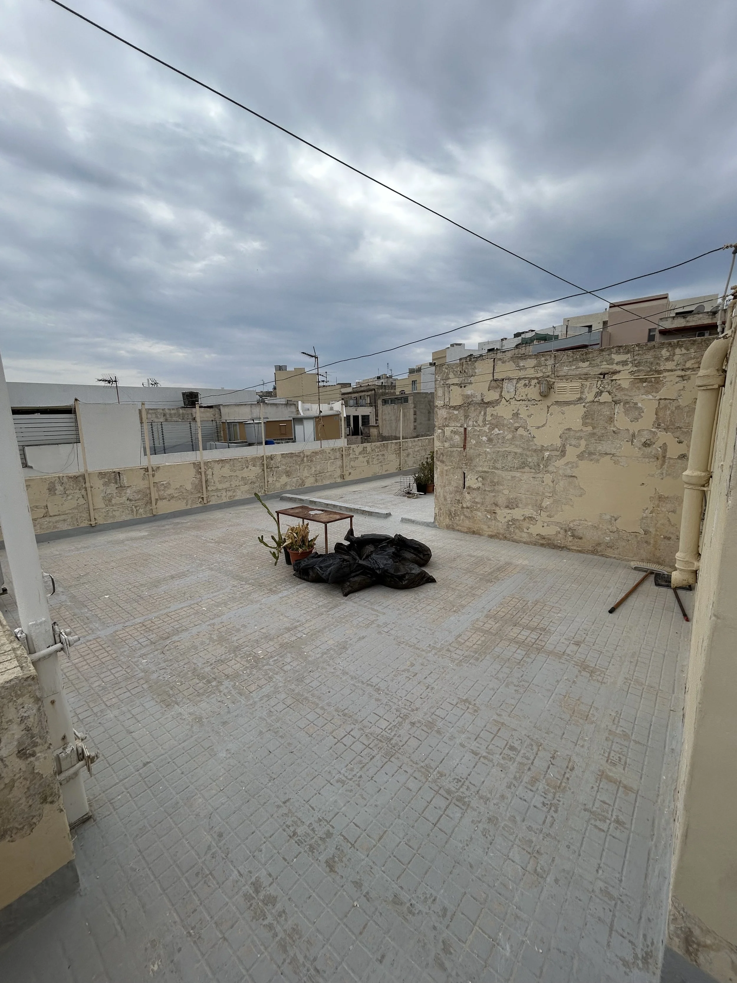 Before image of terrace walls before the painting process.