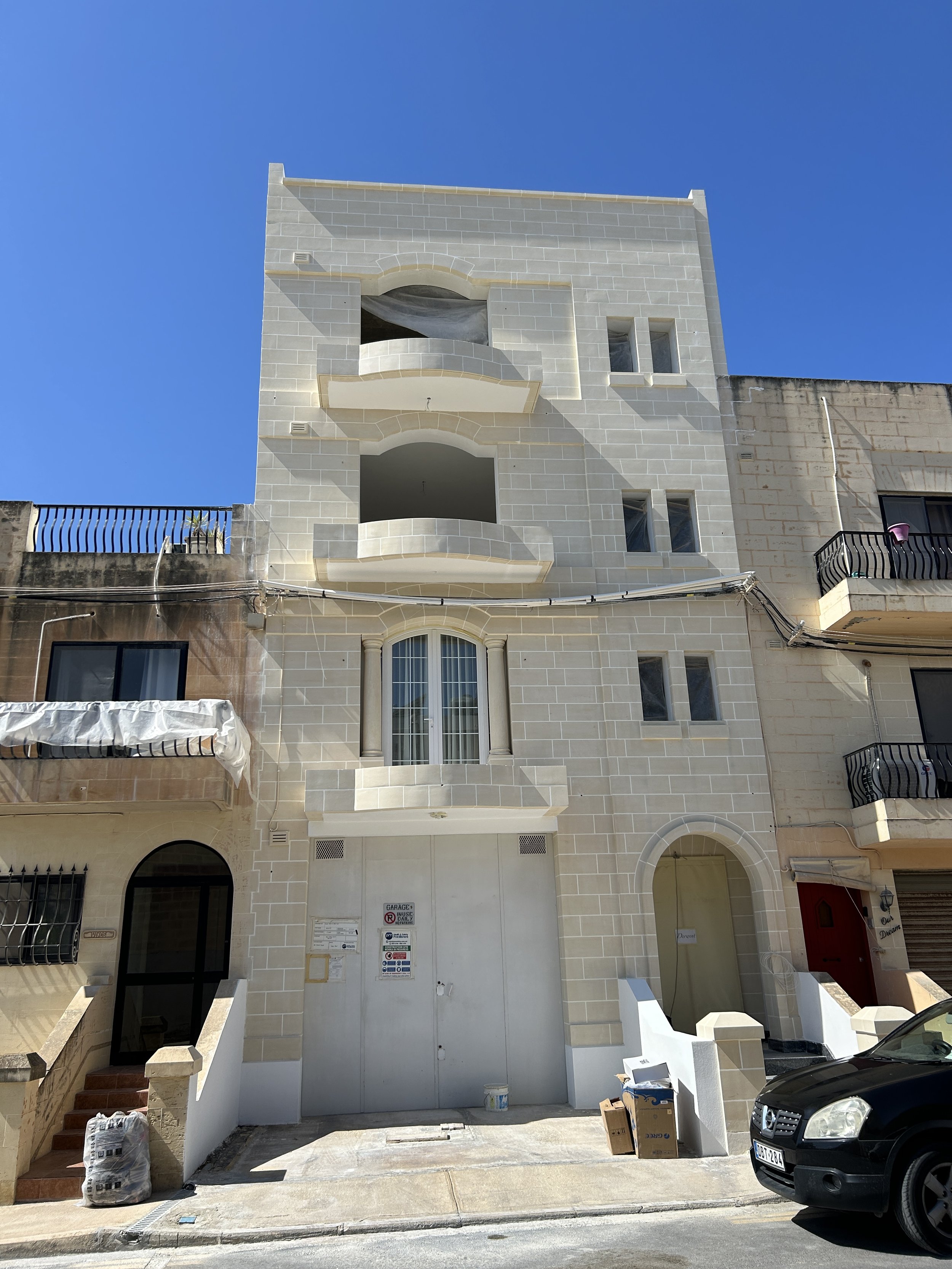 Restored fuq il-fil plastering facade preserving traditional Maltese architectural character