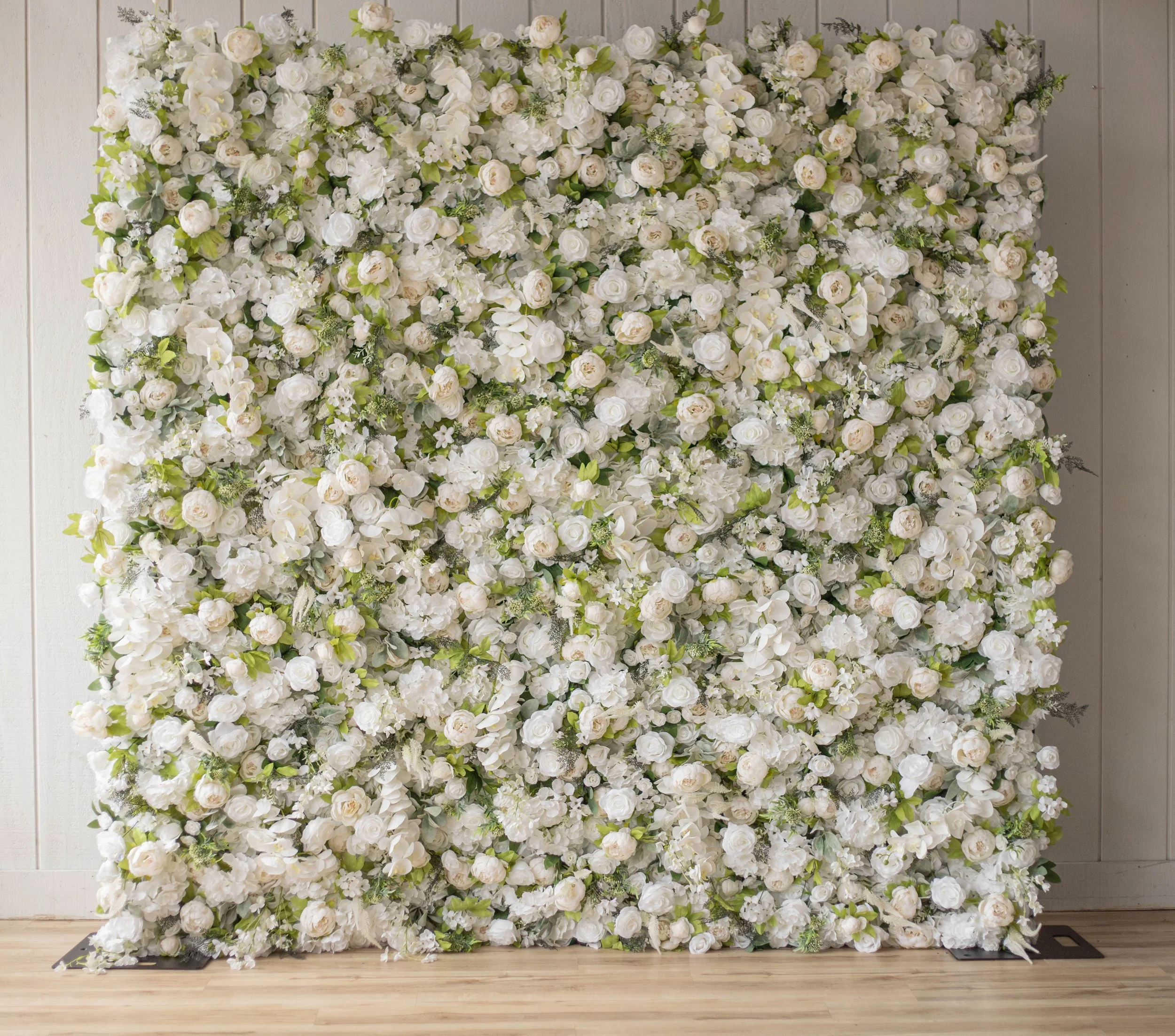 The Emersyn: A lush arrangement of white and ivory blooms with soft greenery, designed for a clean, sophisticated statement. (photo by JLC Photography)