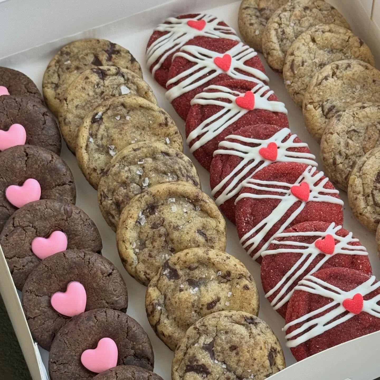 A custom Valentine&rsquo;s cookie box made with love 🥰🍪

Double chocolate, Orange chocolate chunk, Red velvet, and Salted toffee crunch. Which flavor would you go for first?

Custom orders are always welcome &mdash; bring me a vibe, a flavor, or ev