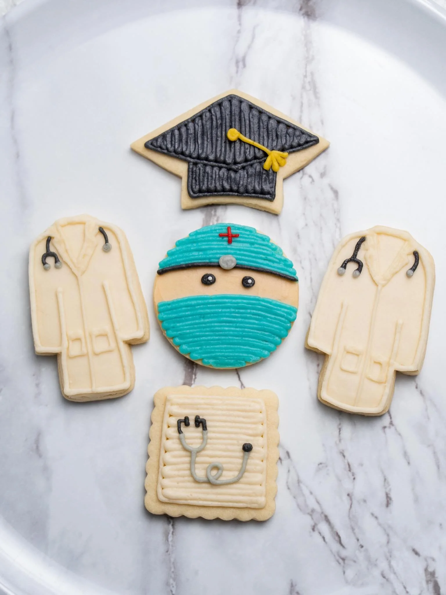 A law school grad, a medical school grad, and a pre-med grad all celebrated at one dessert table!

Custom buttercream sugar cookies, cookie cups, s&rsquo;mores cookies, salted toffee crunch cookies, brown sugar espresso cookies, lemon crinkles&hellip