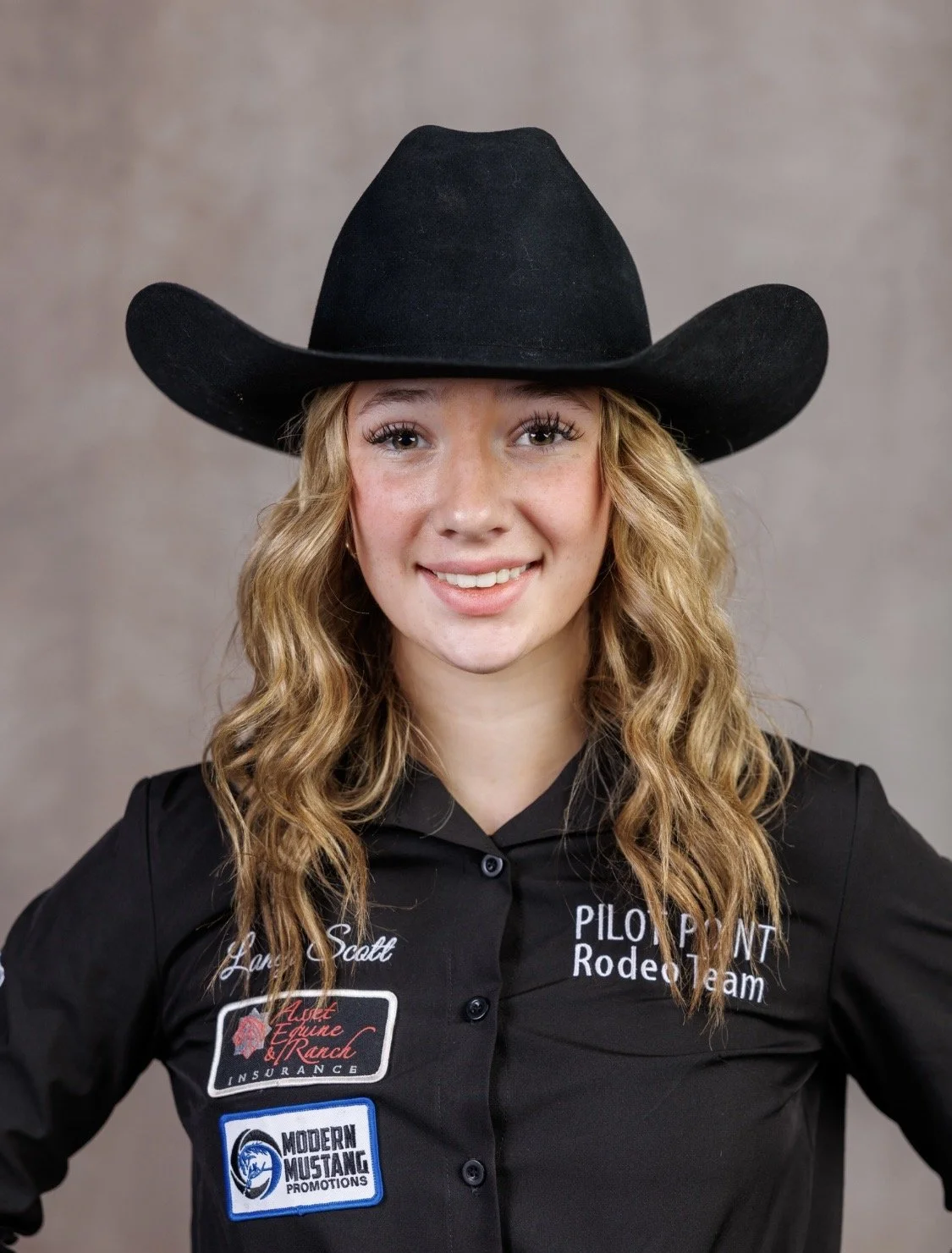 Logo with a cowgirl riding a horse, surrounded by ladder and horseshoes, and text saying 'Pilot Point Rodeo Team'.