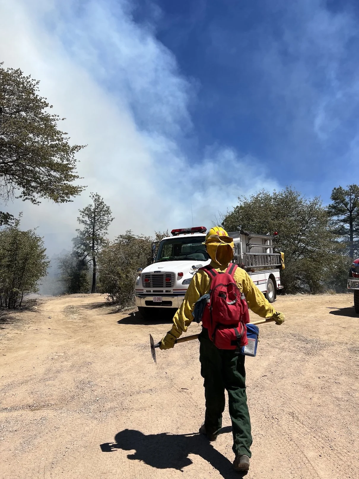 Firefighter with Pulaski