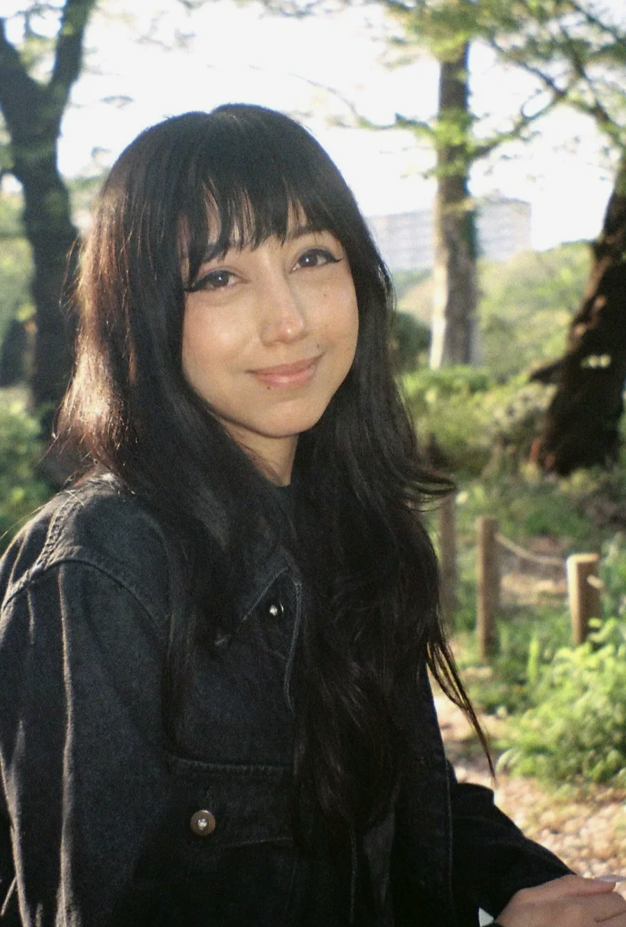 A photograph of the designer in a park in Japan.