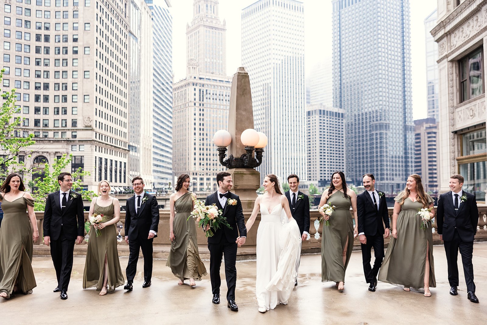 A wedding party portrait with downtown Chicago in the background