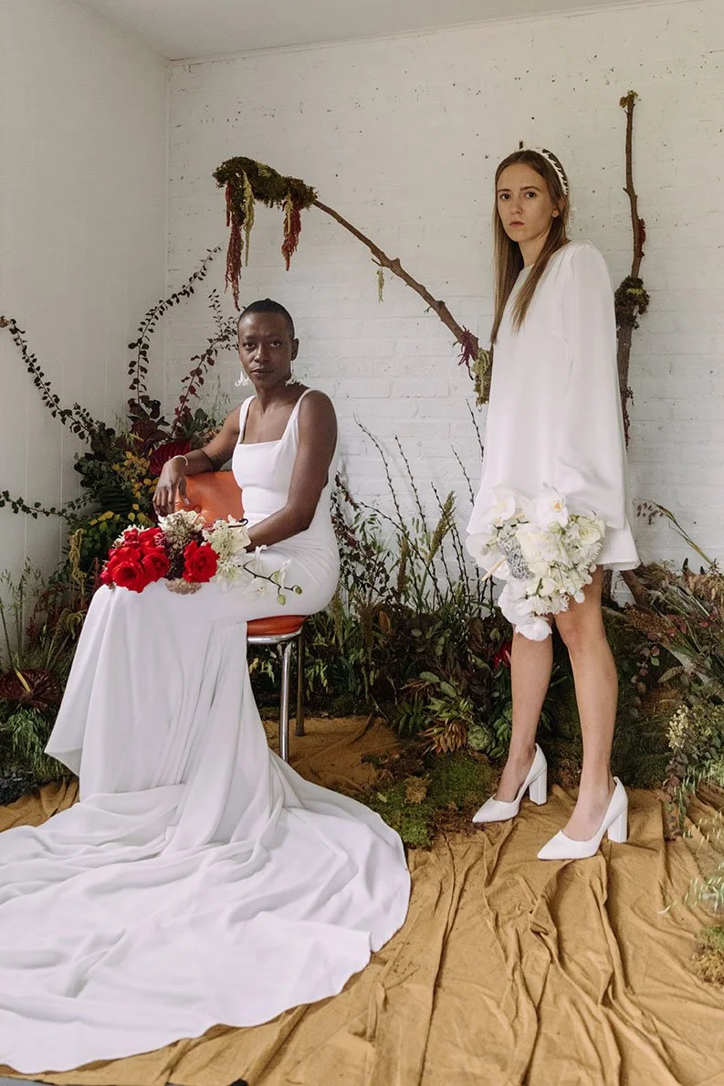 bridal models with bouquets and greenery