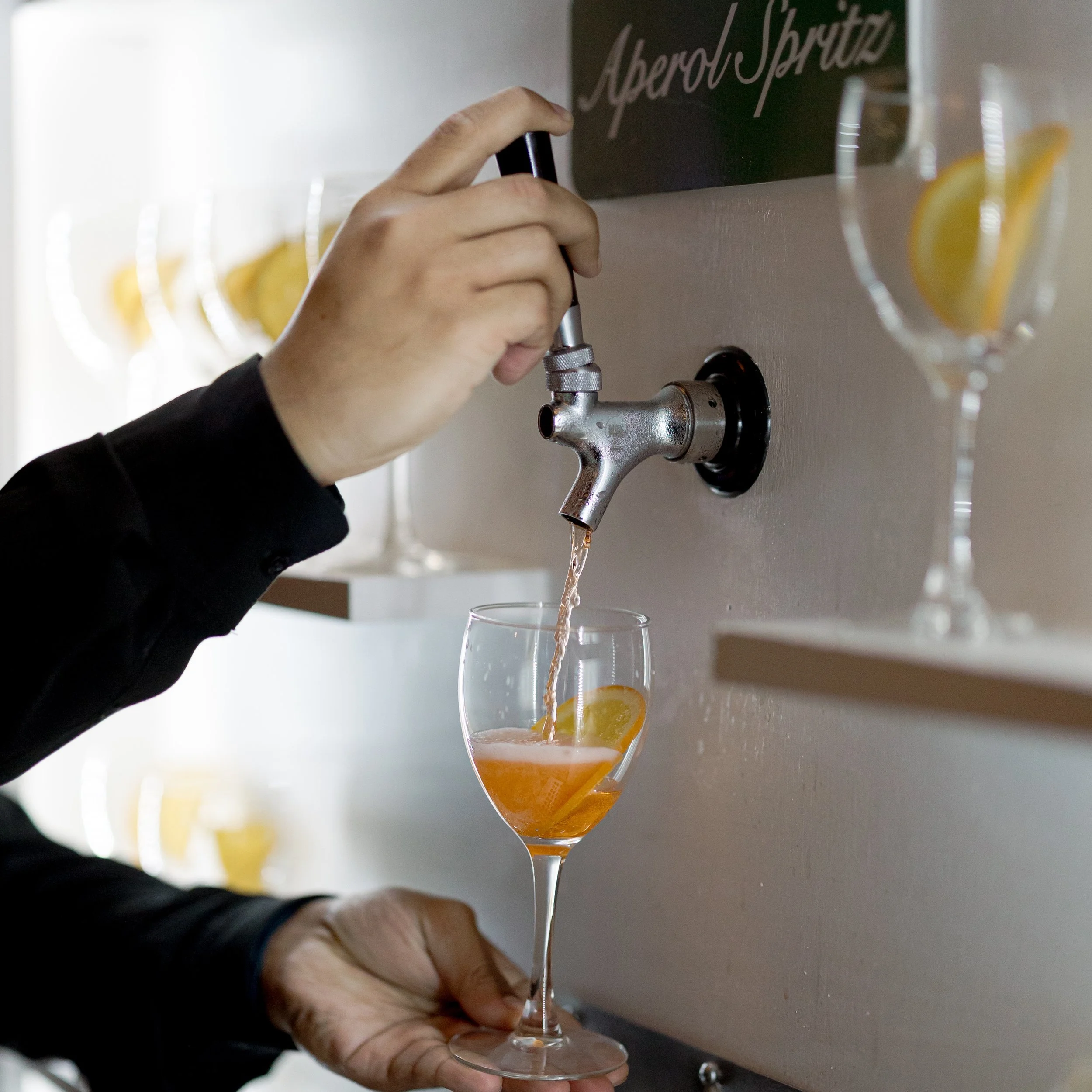 a beverage truck installed for an event pouring Aperol spritz