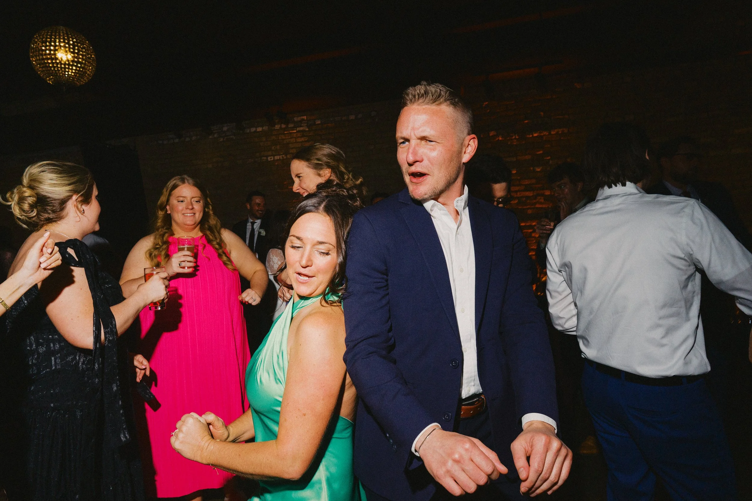 two people dance back to back