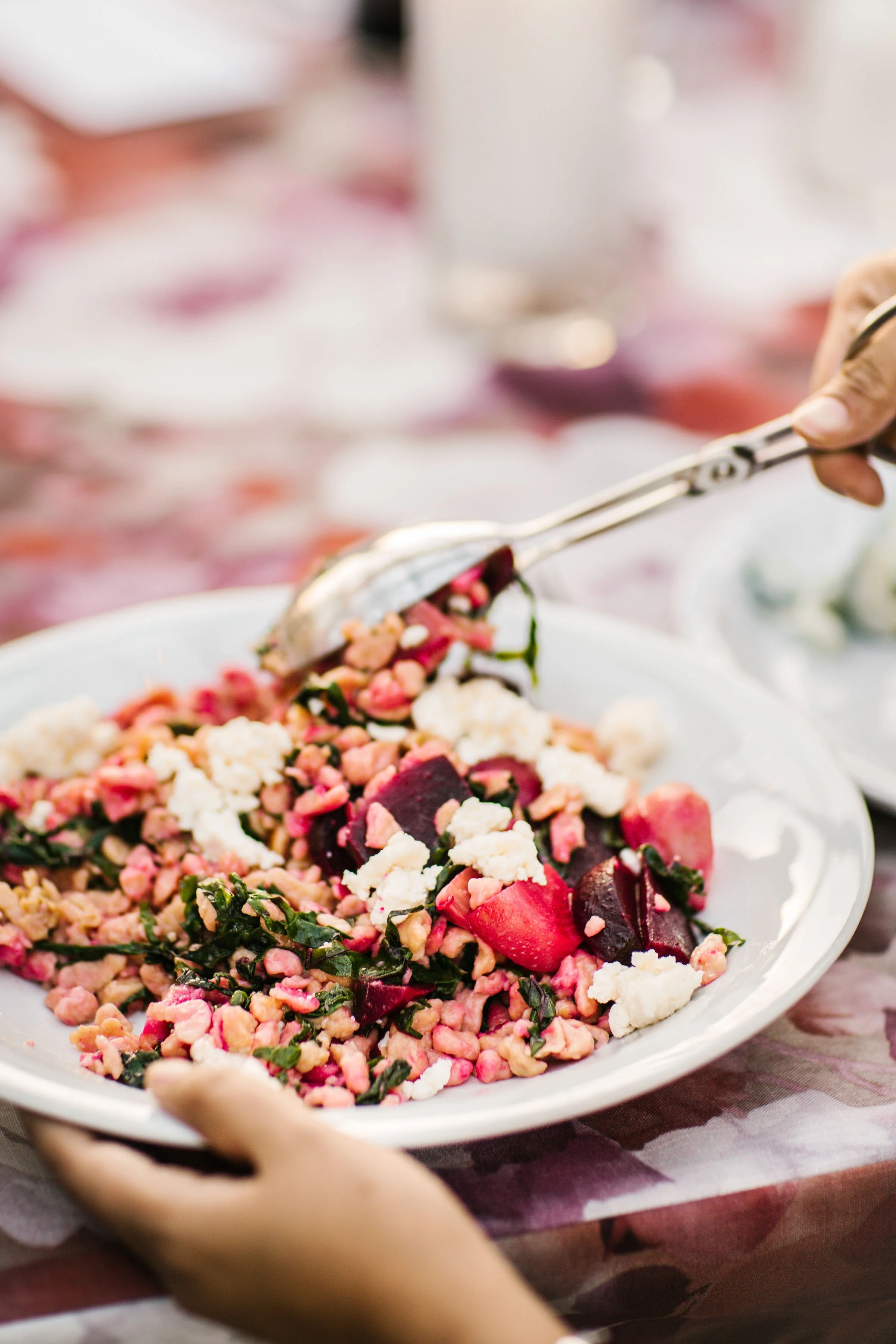 photo of a person serving salad