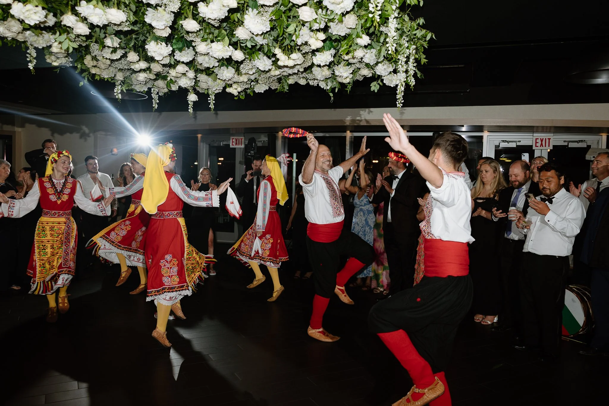 People dancing in traditional outfits
