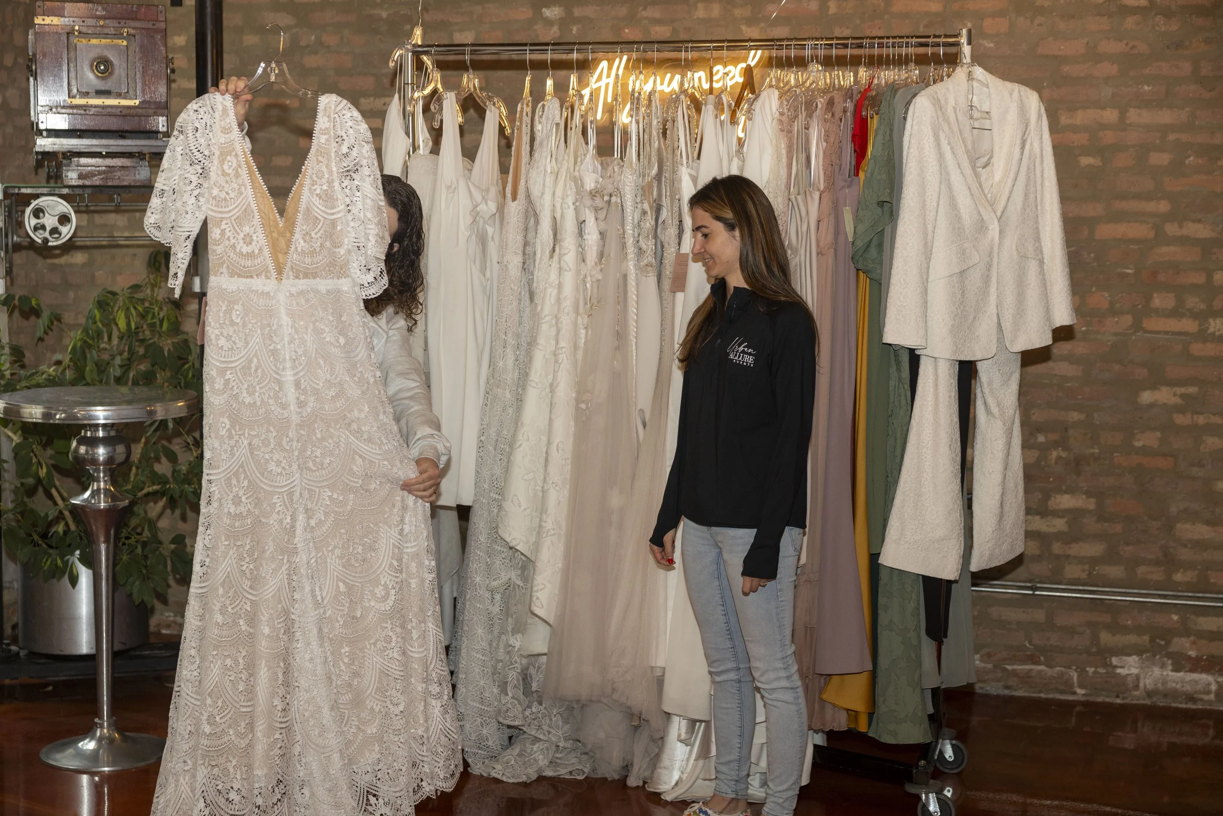 Wedding dresses for resale, hosted at Loft on Lake, an affordable wedding venue in Chicago