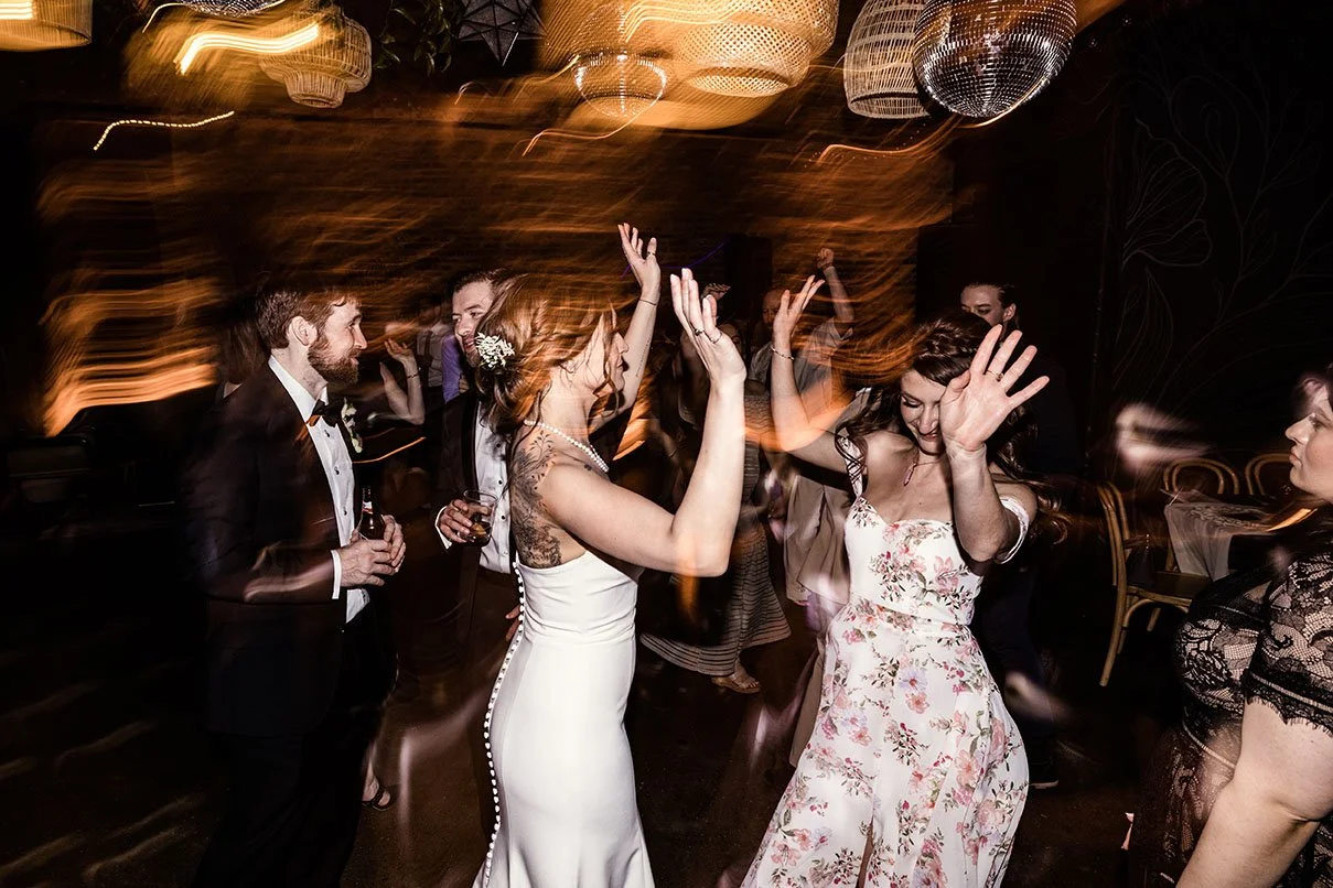people dancing at a wedding