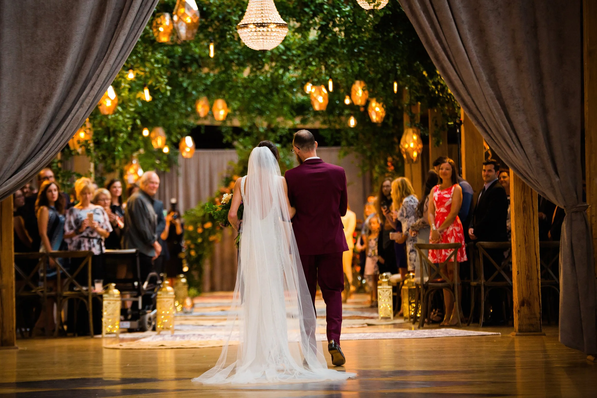 bride and groom walking down the aisle
