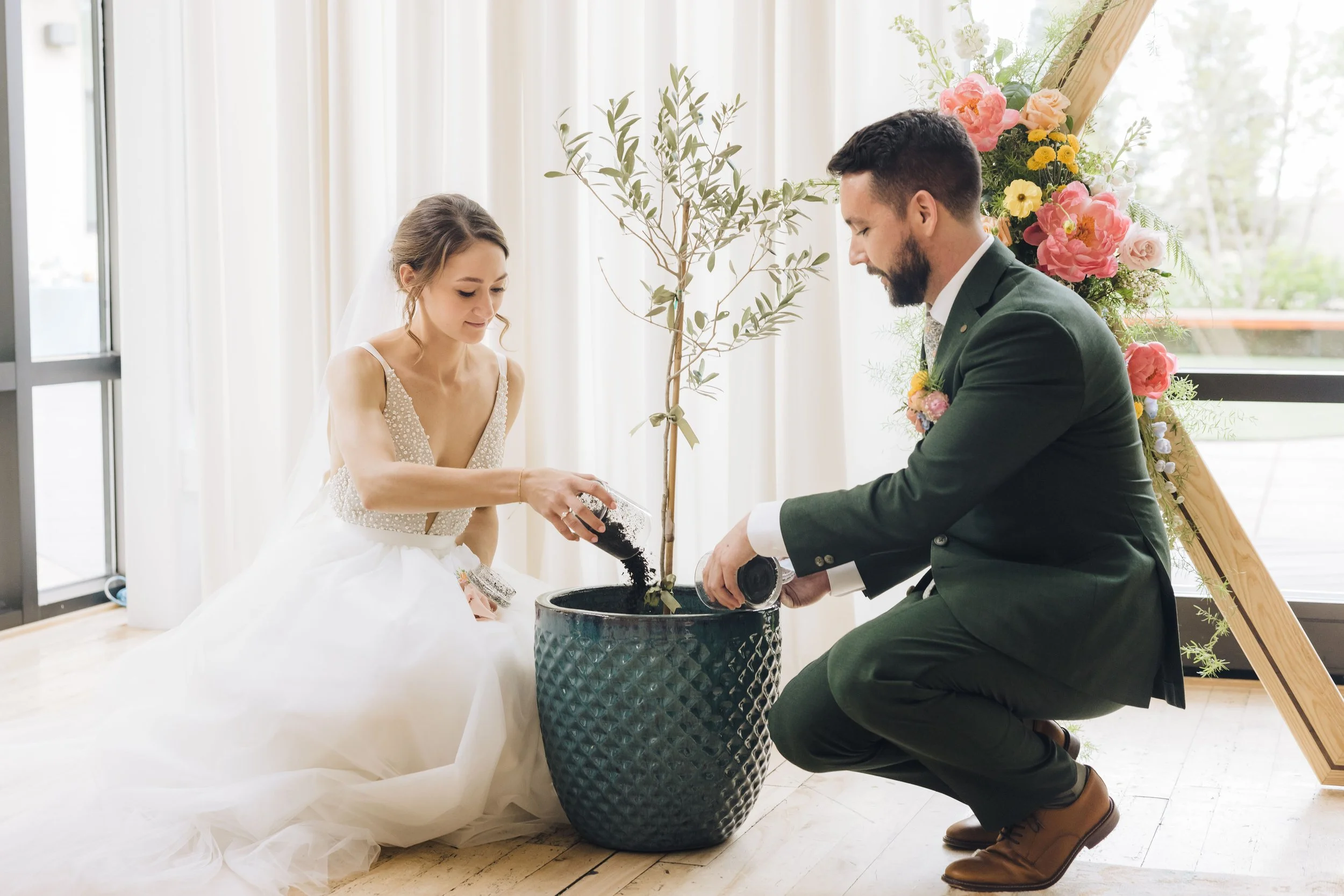 bride and groom planting a tree as a wedding ceremony ritual