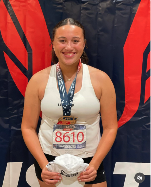 Our athlete medaling at the USA Track & Field competition