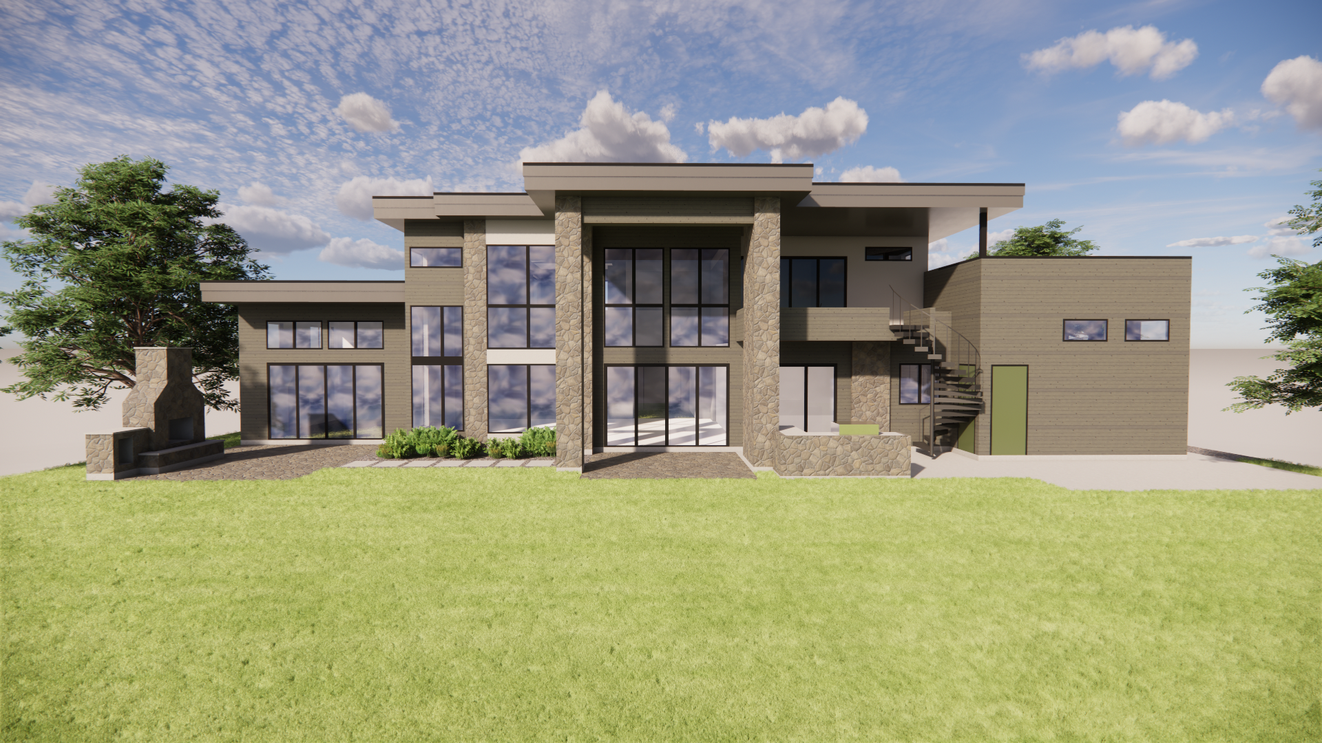 Modern two-story house with large glass windows, stone accents, and outdoor staircase, surrounded by a green lawn and trees, under a cloudy blue sky.