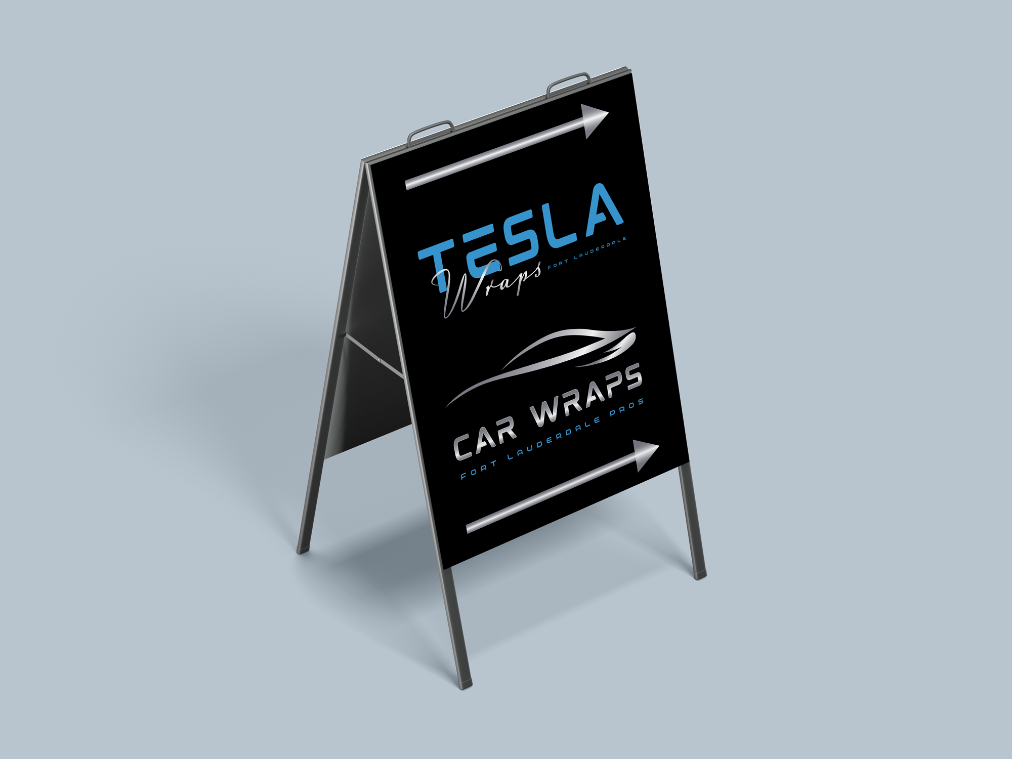 A black A-frame sidewalk sign with blue and white text advertising Tesla car wraps in Fort Lauderdale, featuring a stylized car silhouette and directional arrows.