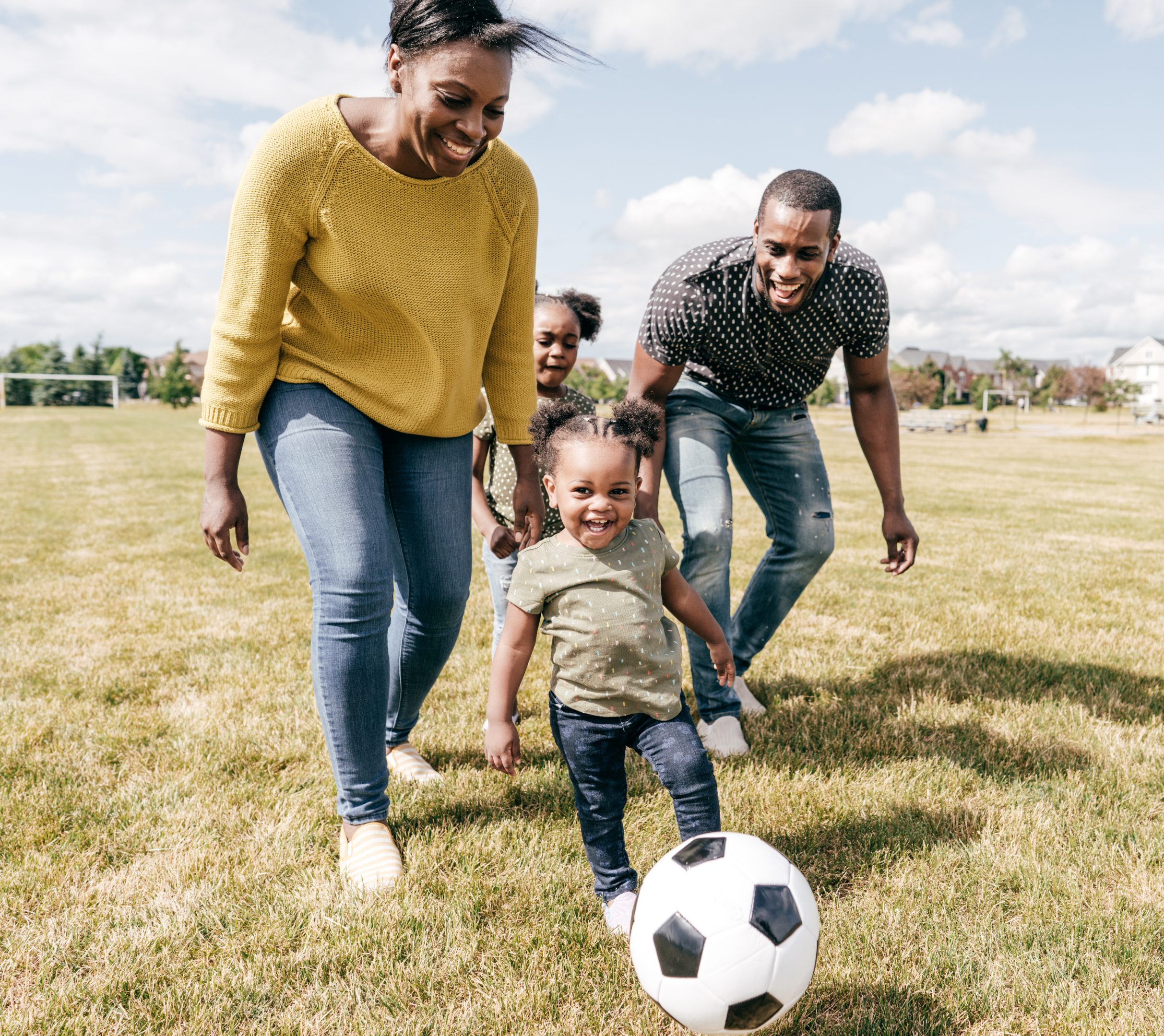 Family Playing Soccer