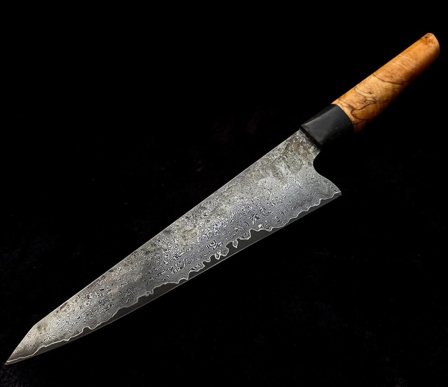 220mm Damascus clad Gyuto with wolfram special core. Ancient bog oak and birch Burl handle.
 
#gyuto #chef #chefknife #damascus #damascusknife #15n20 #80crv2 #wolframspecial #bogoak #sharp #slice