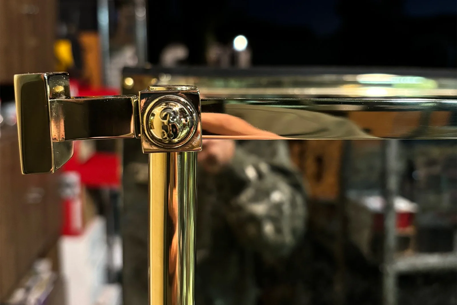 Custom cast brass crest detail