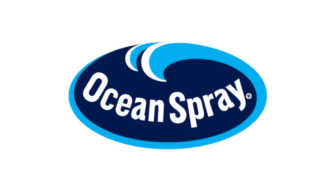 Logo of Ocean Spray with a blue wave and the brand name inside an oval shape.