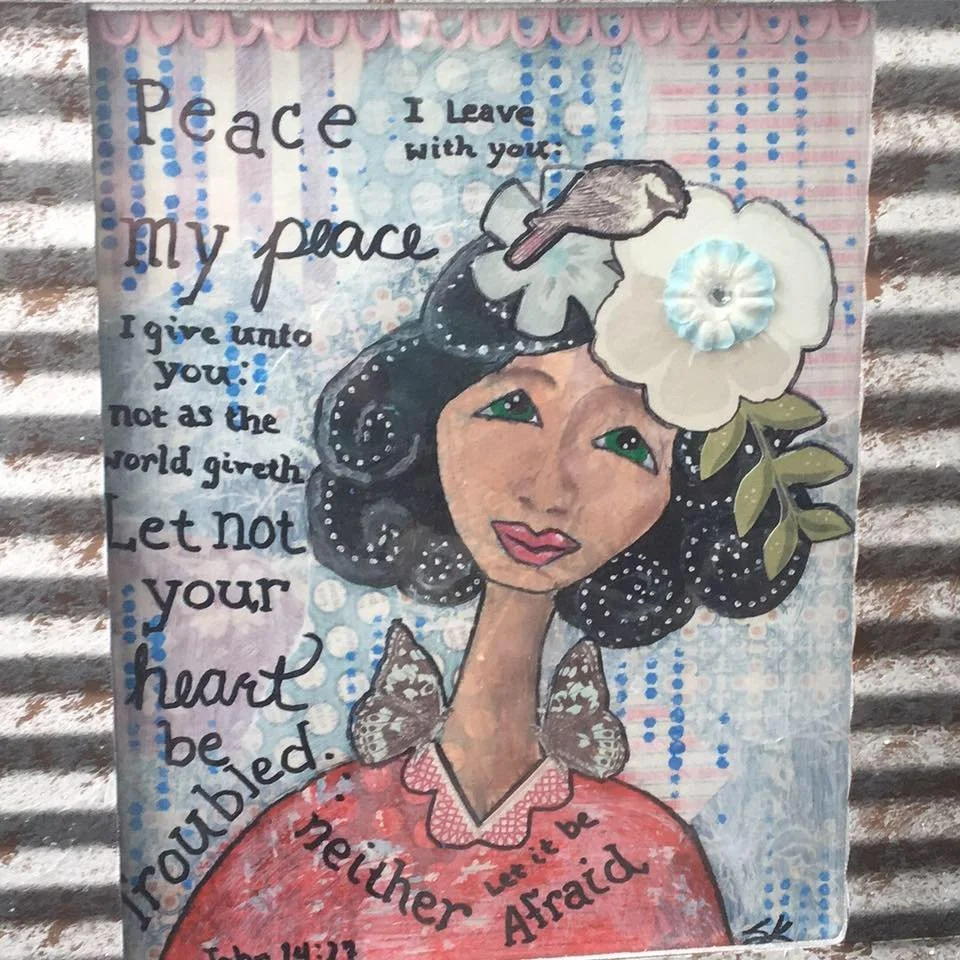 Illustration of a woman with curly black hair, wearing a pink shirt with a lace collar. She has green eyes, pink lips, and is surrounded by butterflies, flowers, and leaves. There is text in a handwritten style that reads: peace, I leave you with you