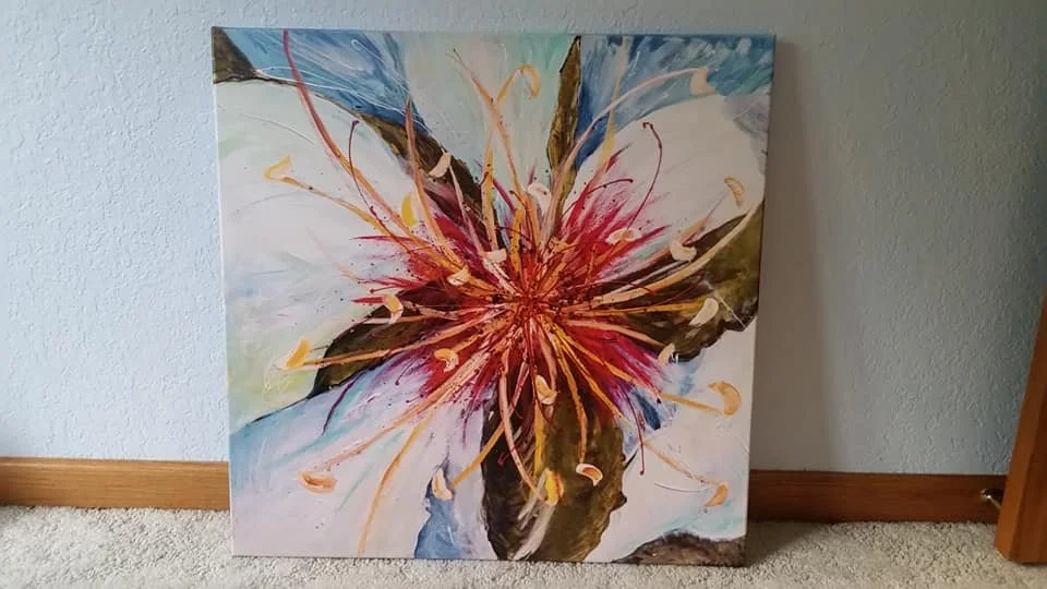 Abstract floral painting with vibrant red, yellow, orange, and brown colors, featuring expressive brushstrokes and dynamic lines.