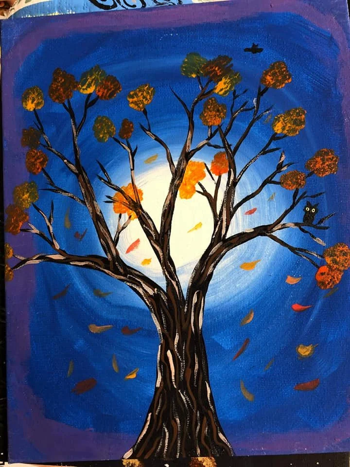 A colorful painting of a tree with orange and yellow leaves in front of a bright moon and a blue sky, with a small black owl on a branch and falling leaves.