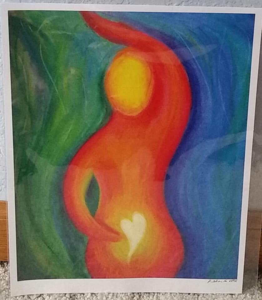 Abstract painting of a nude female figure with a heart in the lower abdomen area, featuring a vibrant mix of green, blue, yellow, orange, and red colors.