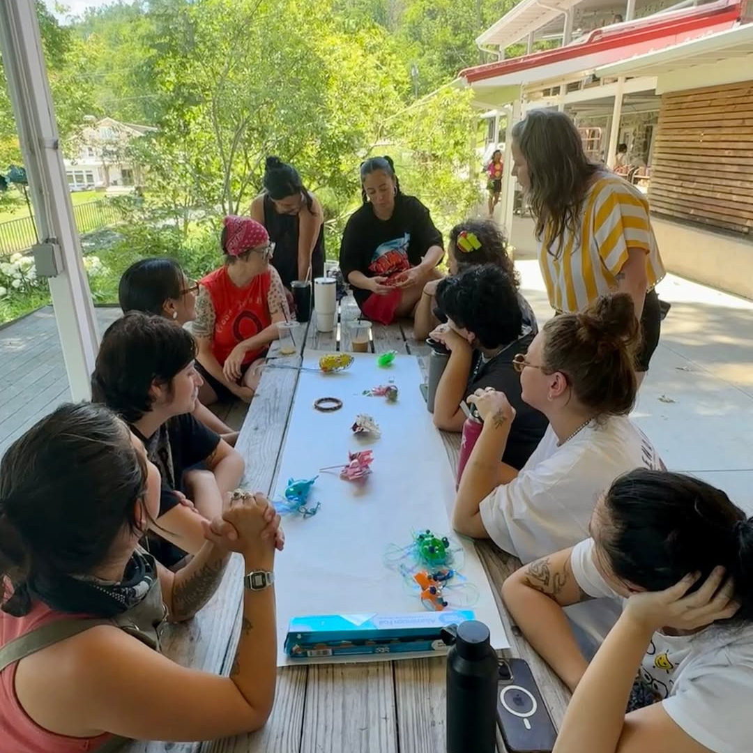 Sarah Rachel Brown leading a critique with students while teaching at Penland School of Craft in 2025.