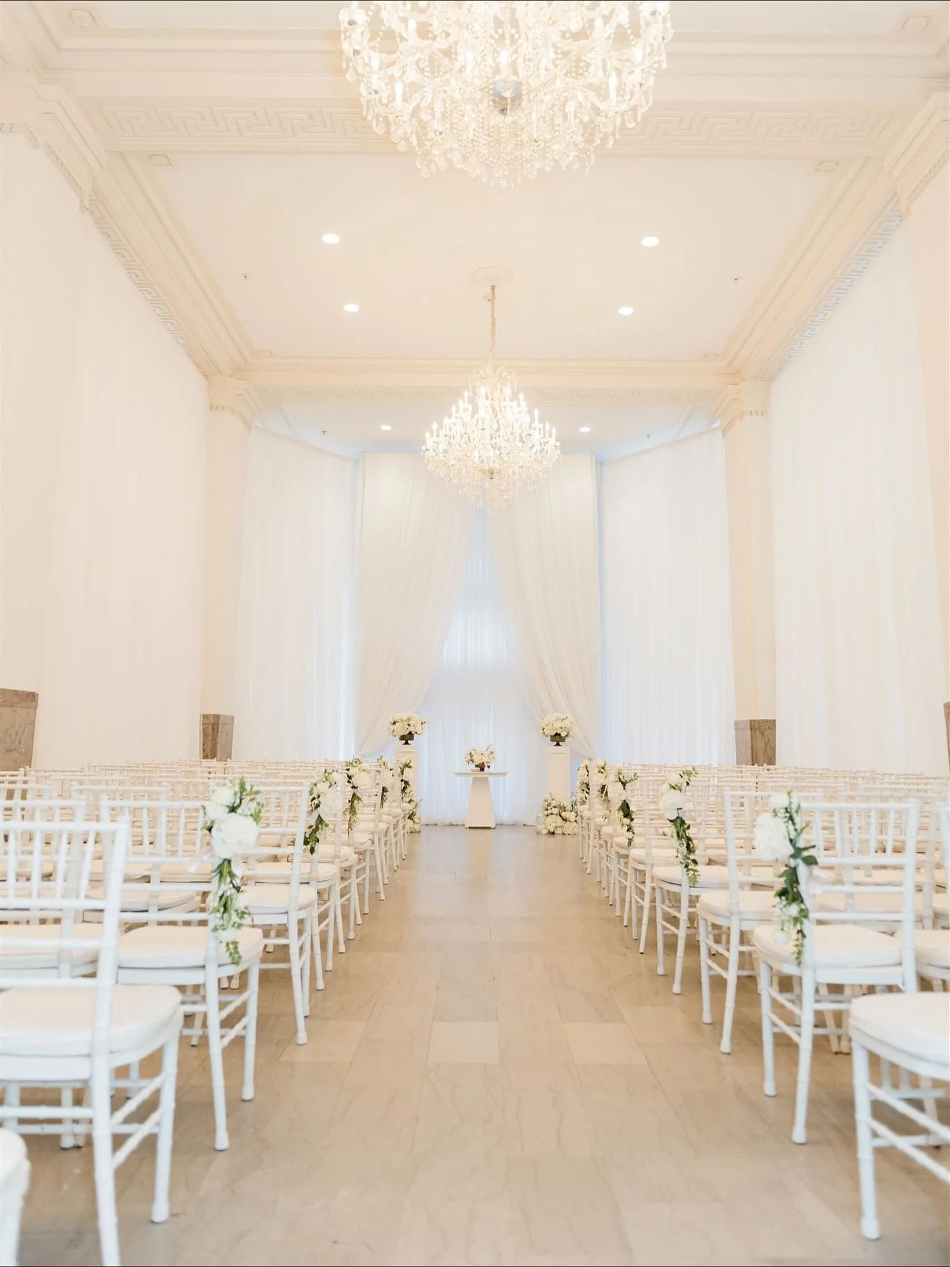 Every detail came together for Dayne and Fiona&rsquo;s gorgeous wedding, proving that classic white and gold never goes out of style. The ceremony space, bathed in soft light from magnificent crystal chandeliers, felt both grand and utterly romantic.