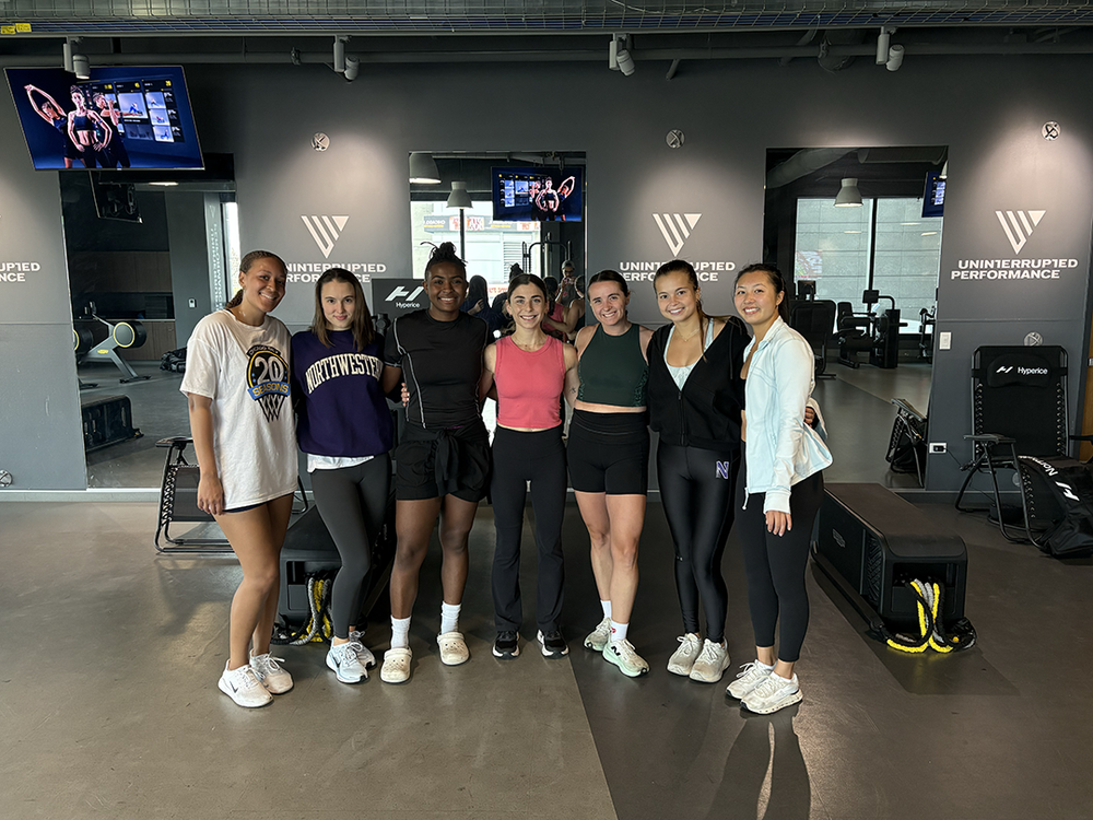Former college athletes together at a NOVA event