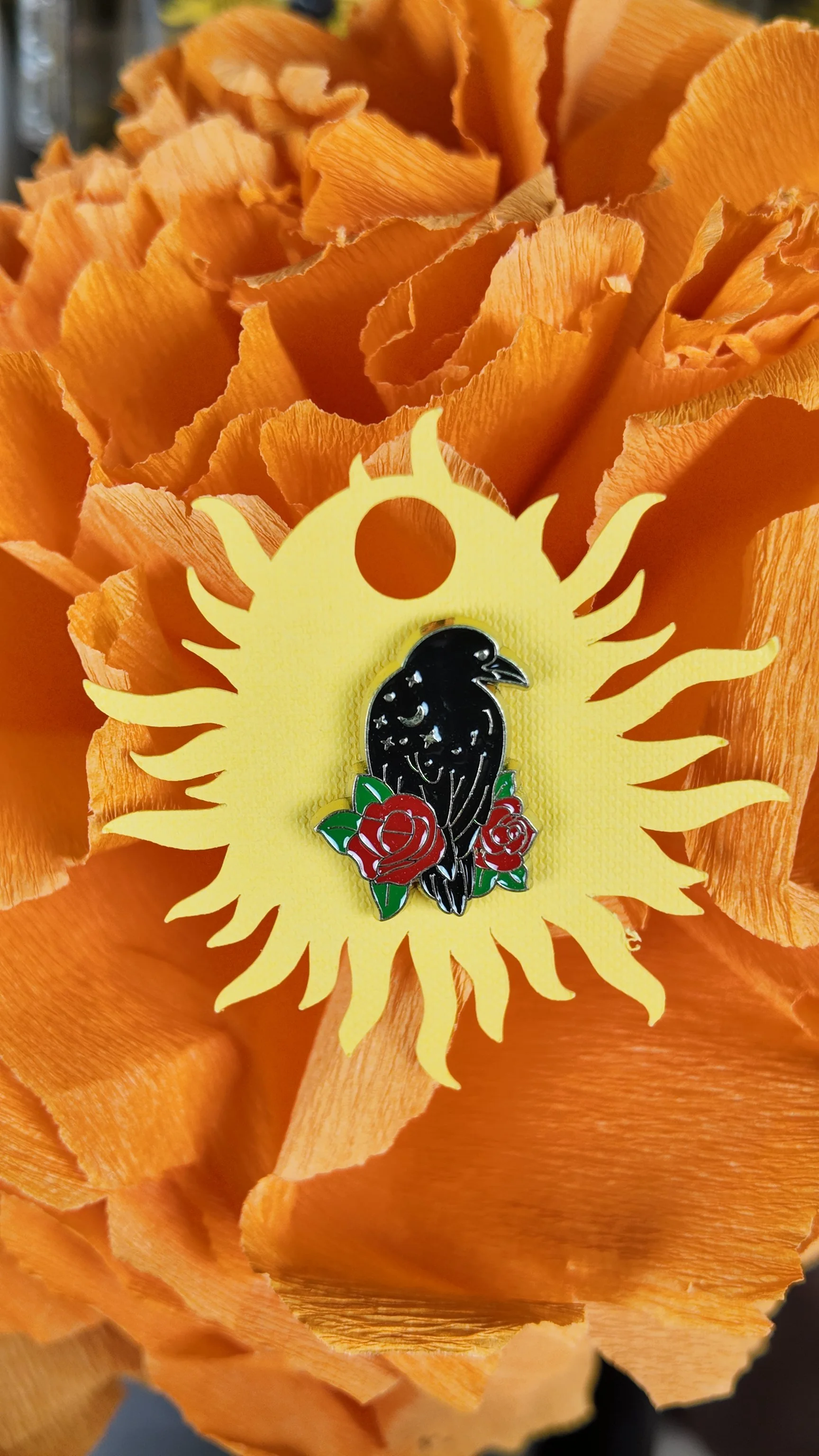 Black crow with red roses