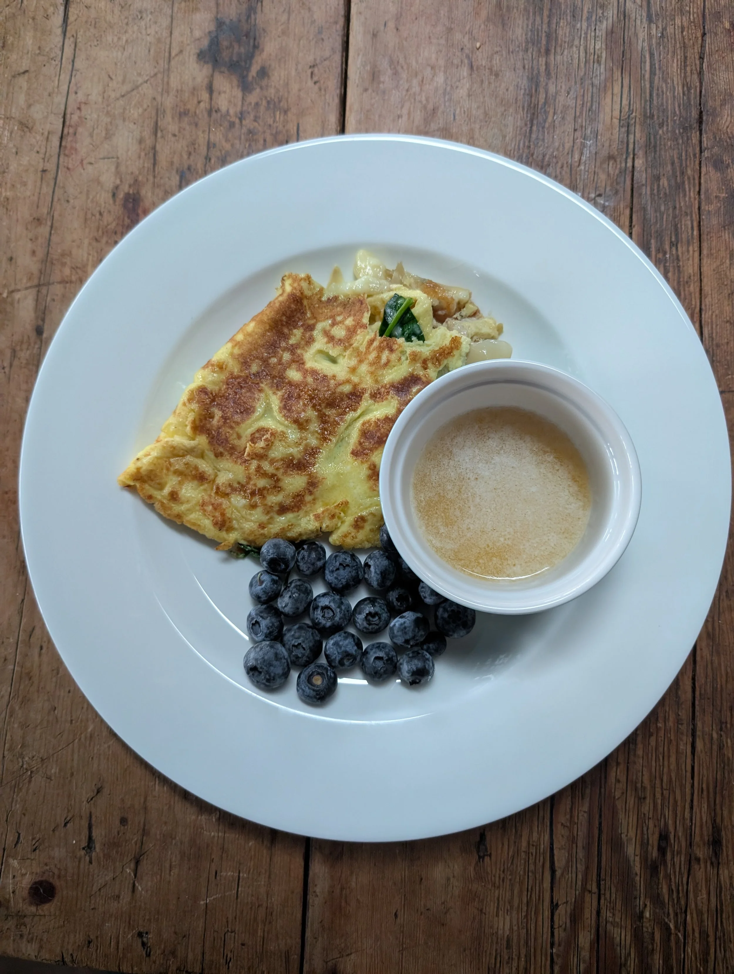 souflee omelete with spinach artichokes and brie.jpg
