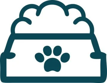 Dog food bowl with a paw print design and food inside.