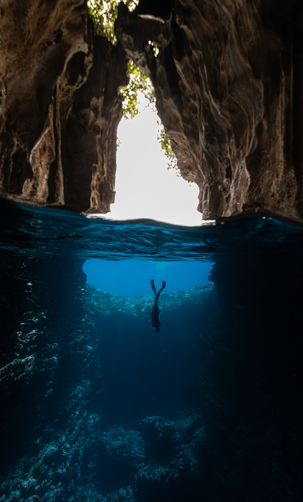Freediver in sea cave