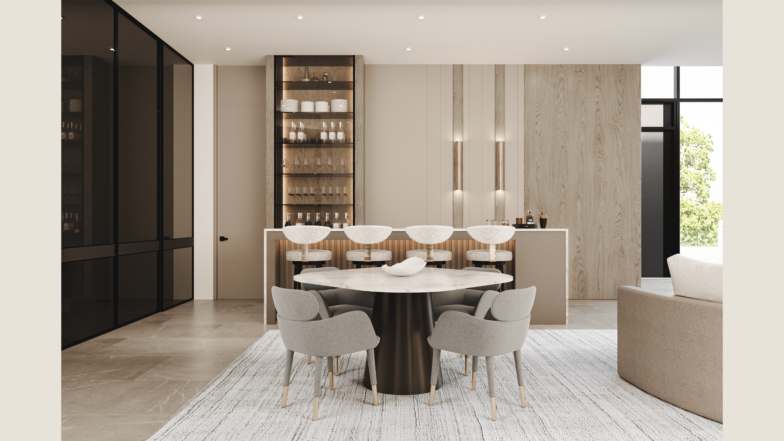 Modern dining area with a round white marble table surrounded by six light gray upholstered chairs, placed on a cream and gray striped area rug. Behind the table, there is a built-in bar with glass shelves displaying bottles, glasses, and white ceramic bowls. The wall has light-colored wood panels and is decorated with vertical wall-mounted lights. A large window on the right offers a view of green trees outside.