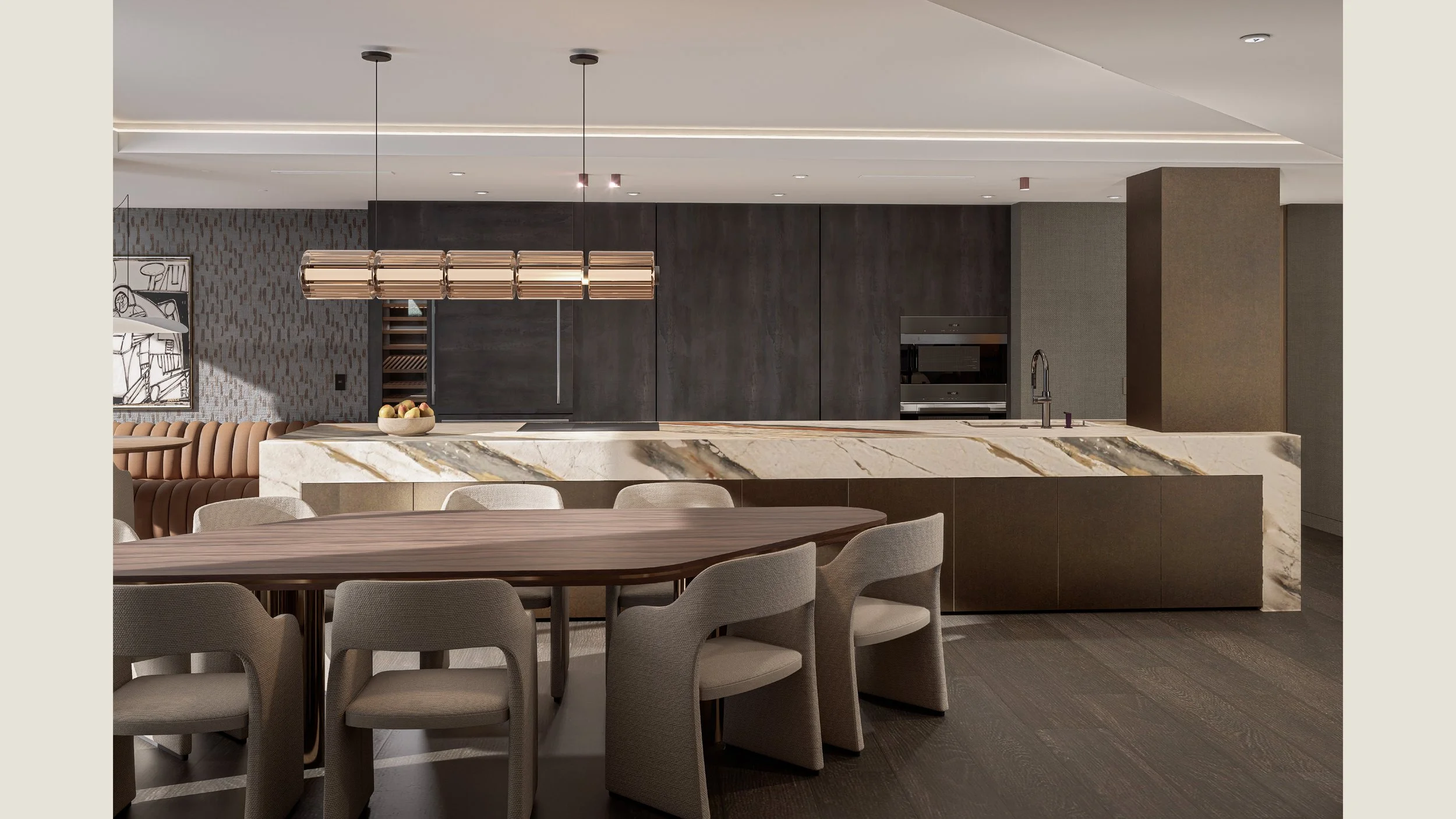 Modern kitchen with dark cabinets, marble island, and dining area with beige chairs.