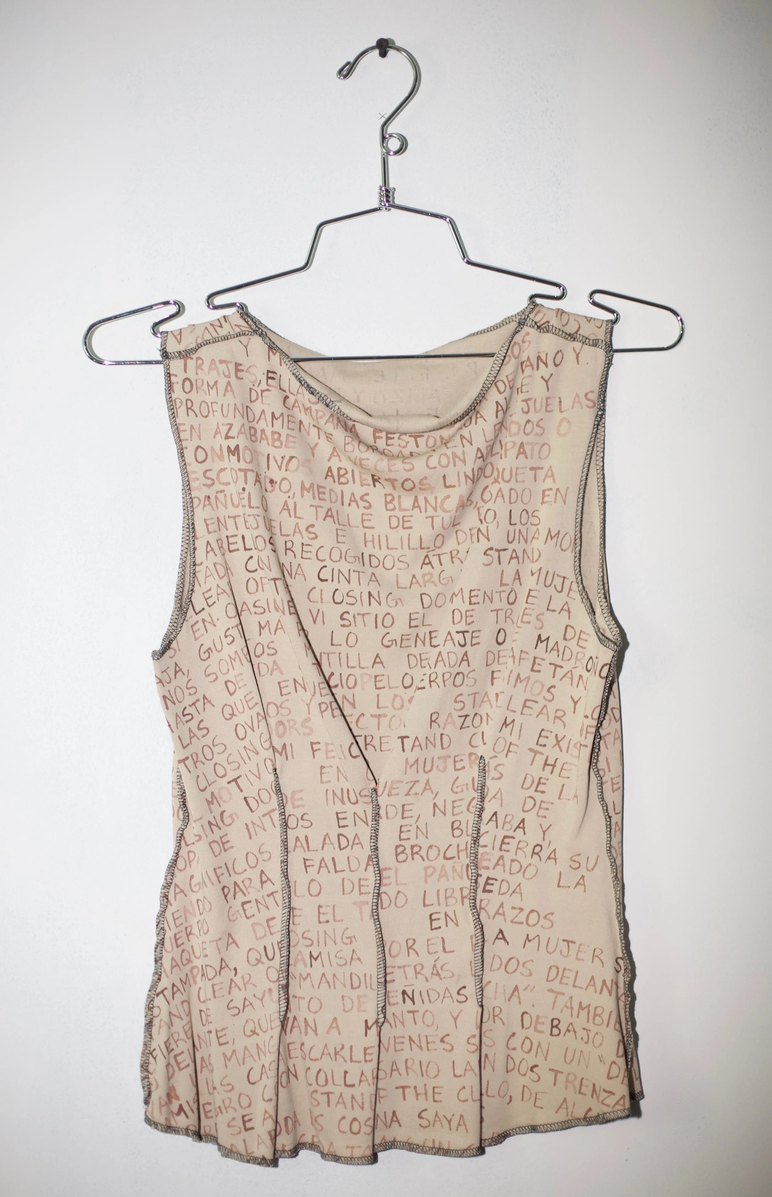 Cotton jersey, hand painted with vintage text from a historical Spanish clothing textbook and letters from my mother.