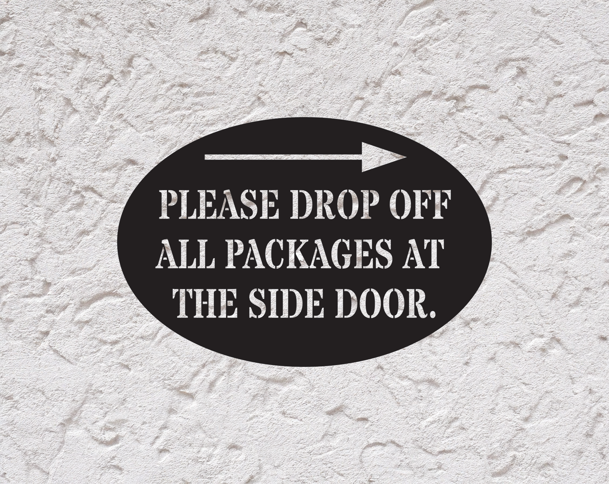 Black oval sign with white text that reads "Please drop off all packages at the side door" and a white arrow pointing to the right.