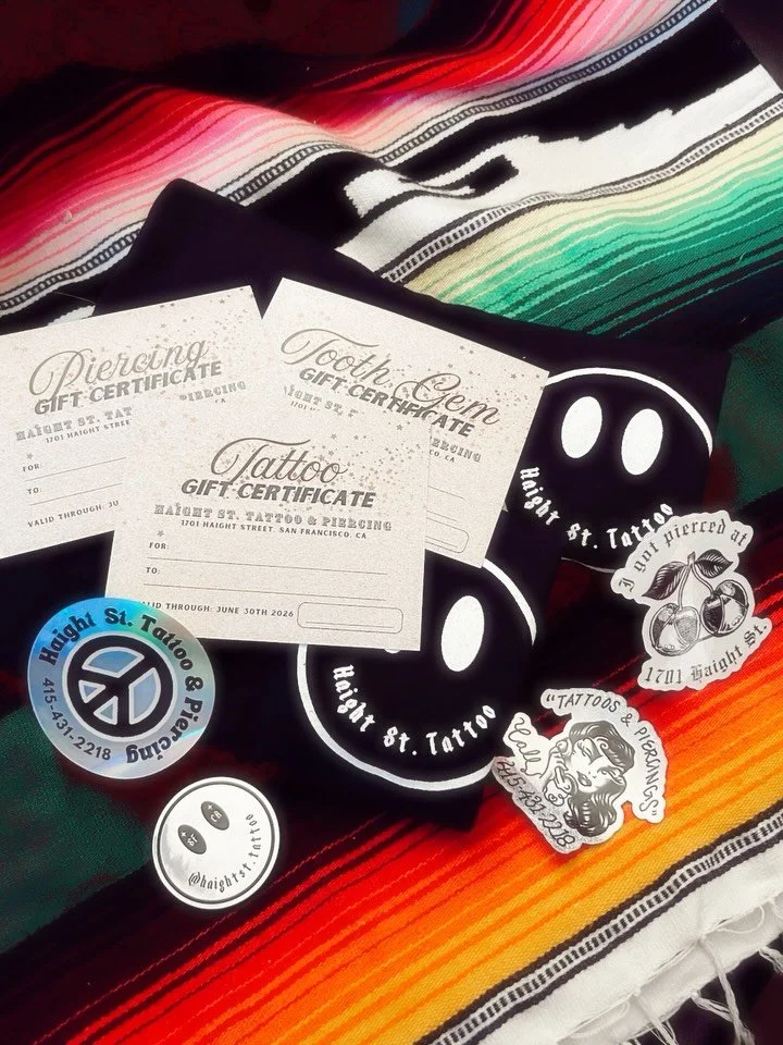 Gifts that will make them go WoOoW! For anyone on your list that loves to adorn themselves ✨

These Gift Certificates are fresh off the press. For a limited time, you can add our shop merch at a discount! $15 Tshirt or a sticker for free.99 😏

*Tatt