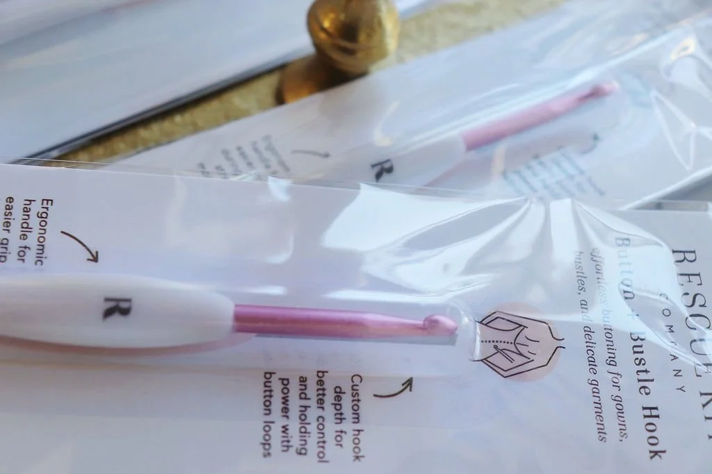 Rescue Kit Button and Bustle Hook close-up