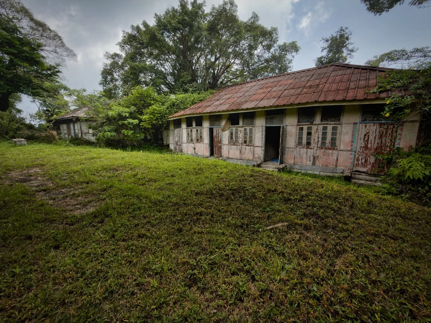 A little side building I explored when I was prowling the grounds of the abandoned Crag Hotel in Penang Hill. I was going to call the Pottery Barn about the tea crates they could repurpose for $600 a piece, but they look fine right where they are at.
