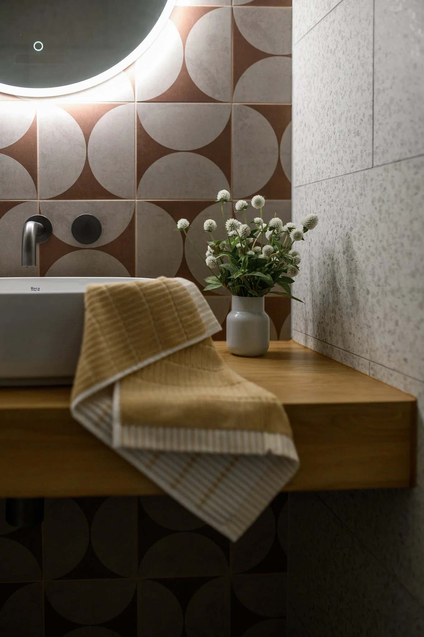 Interior photography of a renovated Pasadena bathroom featuring modern fixtures, feature wall tiles and contemporary design details.