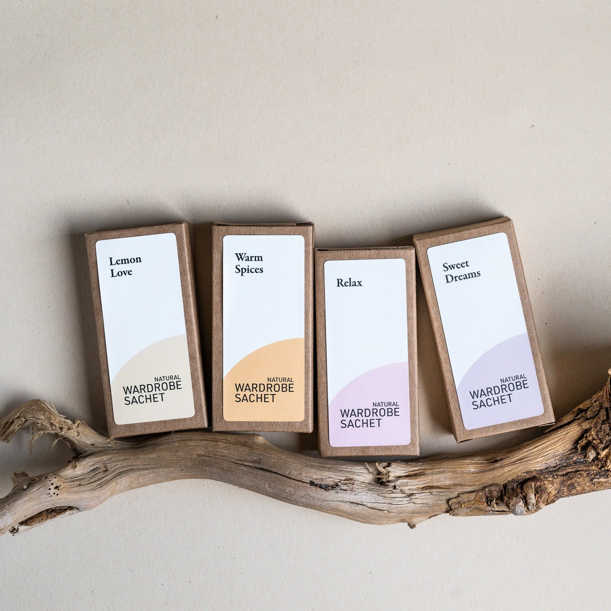 Packaging design and studio product photography for natural wardrobe sachet boxes.