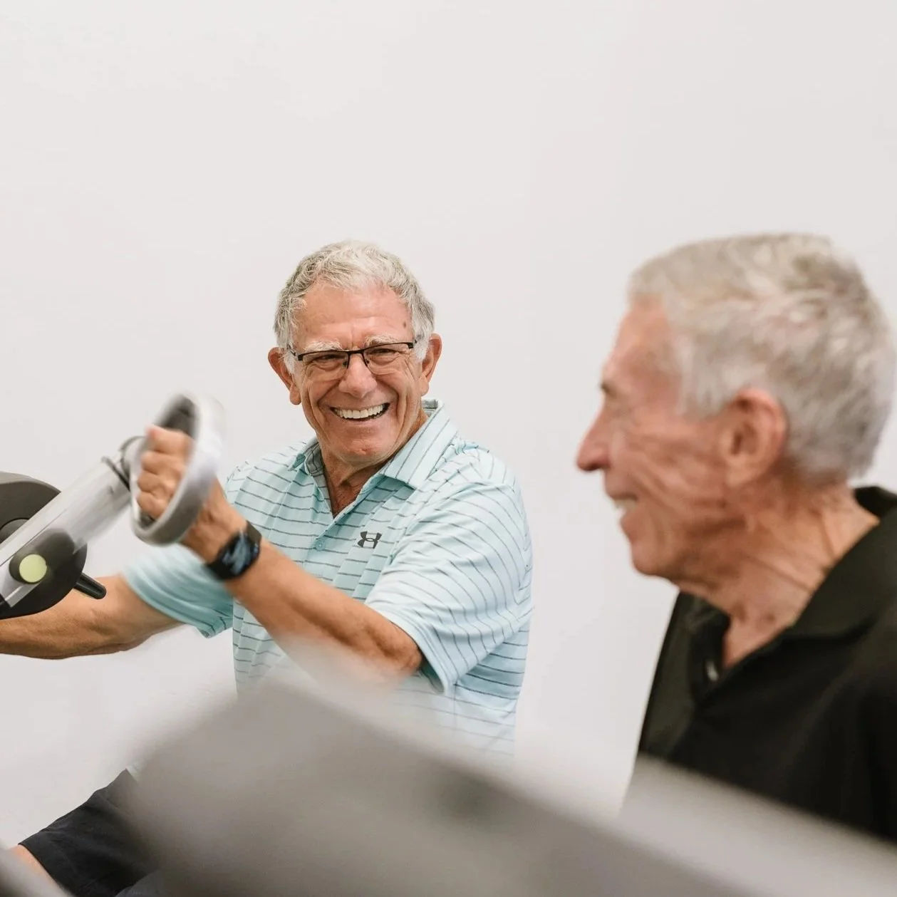 Active seniors in a gym workout session during a commercial branding shoot in Unley.