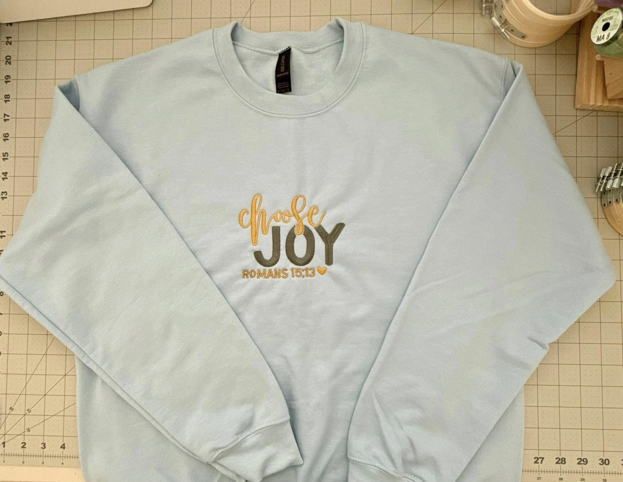 Choose JOY light blue sweatshirt front.jpg