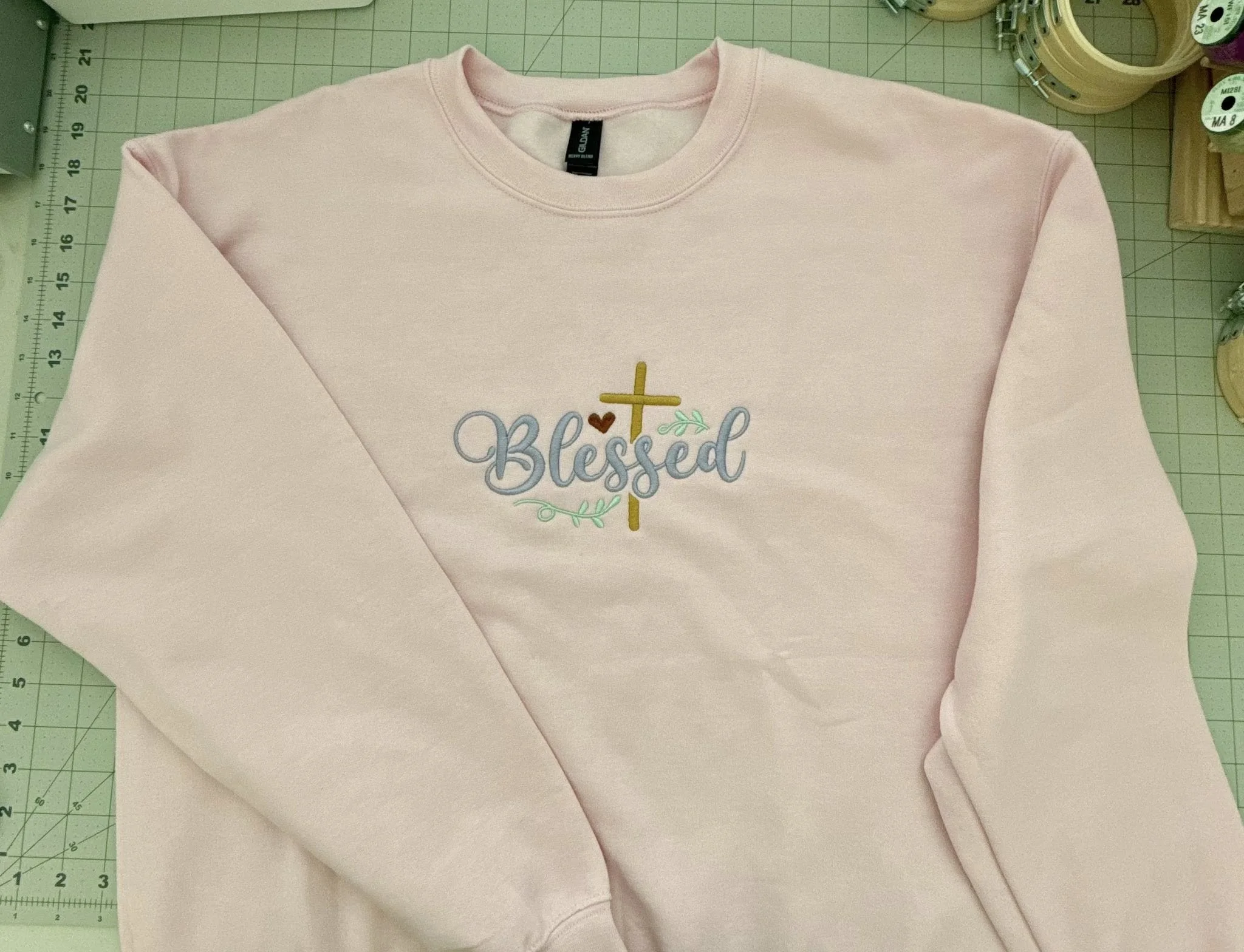 Blessed with cross and flowers sweatshirt pink front.jpg